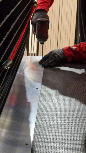 <p>Fit the L-angle alloy plate to the front of the van, ensure it is flush each side.</p>
