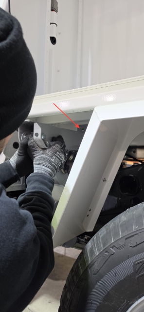 <p>Locate this hole on the chassis rail. It is the top hole and the front set of holes.</p>