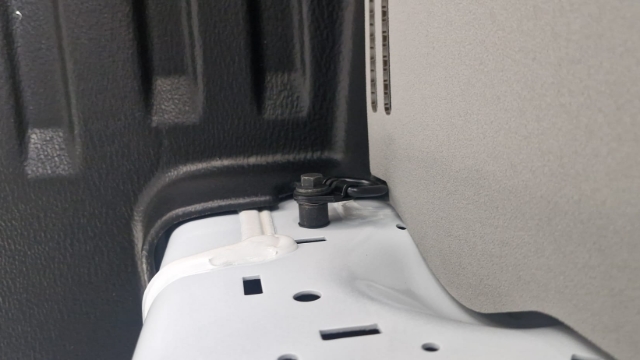 <p>Remove the tie-down points and remove the spacers from the tie down point. Retain the spacers for the upcoming installation step.</p>
