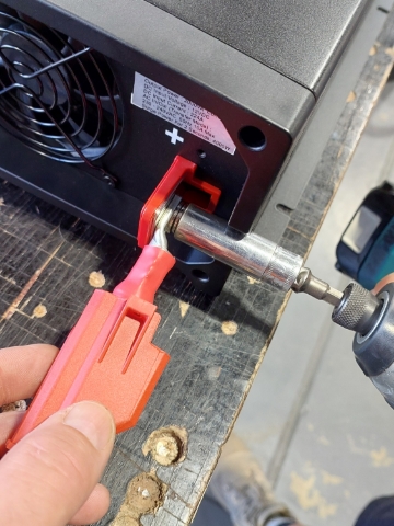 <p>Install supplied 50mm power cable to positive stud on inverter using 13mm socket angling ring terminal down slightly.</p>