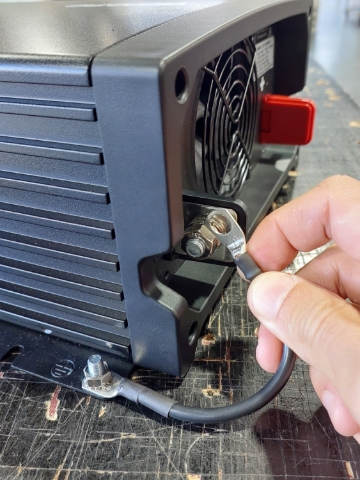 <p>Install earth cable provided to body earth stud. Second ring terminal on cable will be fitted to negative stud once inverter is in canopy and main earth cable is fitted.</p>