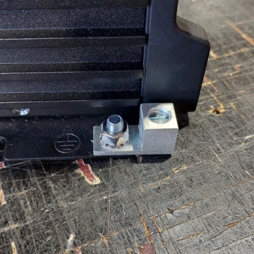 <p>Using 10mm socket remove factory body earth.</p>