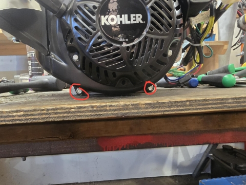 <p>Remove these two 10mm bolts.</p>