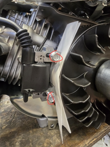 <p>If you have feeler gauges, Use feeler gauges to measure coil spacing from flywheel. If not grab a piece of paper and fold it until it fits snug between coil and the flywheel and put aside for reassembly. Remove the two 10mm bolts holding on coil. </p>
