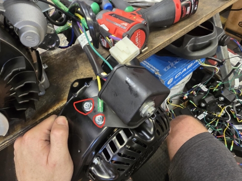 <p>Remove flywheel cover. Then remove ignition switch assembly, x3 10mm bolts.</p>