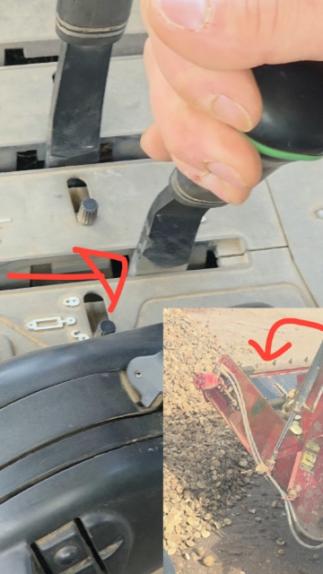 <p>Once at the feed area, Green lever rearward drops the feed elevator</p>