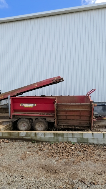 <p>Return the trailer to the conveyor area. Note the front third of the trailer is where the conveyor will unload. </p>