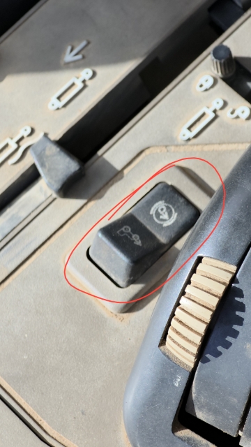 <p>Four wheel drive switch. If needed, toggle forward to activate four wheel drive. </p>