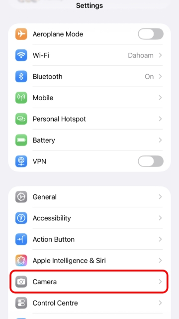 <p>Select <strong>Camera</strong> ></p>