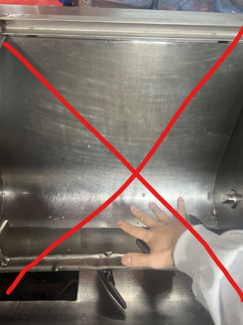<h2>Machines with Internal Chambers and Moving Part/ Filler</h2><p></p><p><strong>Operation:</strong> </p><ul><li><p><strong>Never put hands or arms inside the machine</strong> while it is running.</p></li><li><p><strong>Do not use metal tools</strong> to scrape or push materials — only <strong>non-metallic </strong>tools are allowed.</p></li><li><p>For Certain Machine, If material is stuck or hanging, switch off the machine and disconnect the power. Wait until all moving parts have come to a complete stop before removal.</p></li><li><p><strong>For the other machine, tell team leaders immediately. Do not reach in. Do not try to fix it yourself.</strong></p></li><li><p>Do NOT touch or use tools to reach into any part of the machine that you cannot clearly see.</p></li><li><p>If someone is working inside or inspecting the machine, it is strictly forbidden for anyone else to start the machine.</p></li></ul><p> </p><p><strong>Cleaning</strong></p><ul><li><p>Wait until the machine has <strong>cooled down completely</strong> before starting.</p></li><li><p><strong>Never </strong>reach into internal chambers without confirming the machine is <strong>powered off and cannot restart.</strong></p></li></ul><p></p>