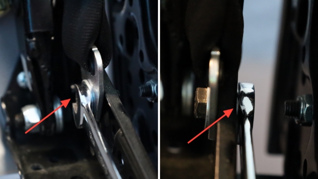 <p>Use two 13mm spanners to remove the seatbelt from the seat base fastening point.</p>
