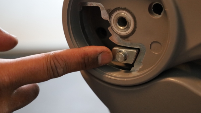 <p>Lift the armrest slightly to remove</p>