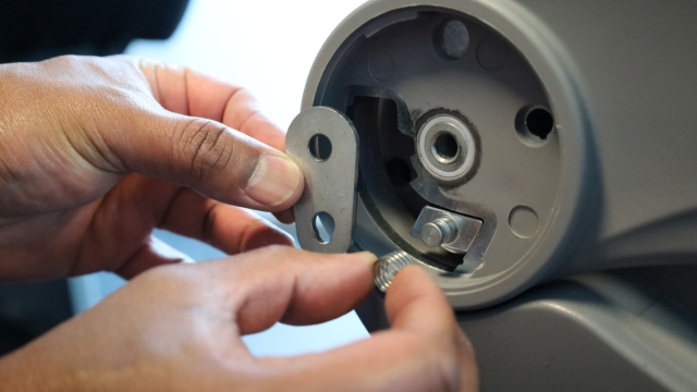 <p>Remove the bolt guide and spring.</p>