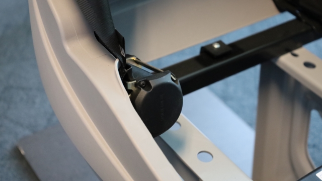 <p>To remove the retractor reel you will need to remove the side seat cover.</p>