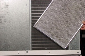 <p>Clean the condenser air filter (self-contained air-cooled models only). While the clean cycle is running, lift out the condenser filter at the rear of the machine, flush it with water to clean it, then reinstall it.</p>