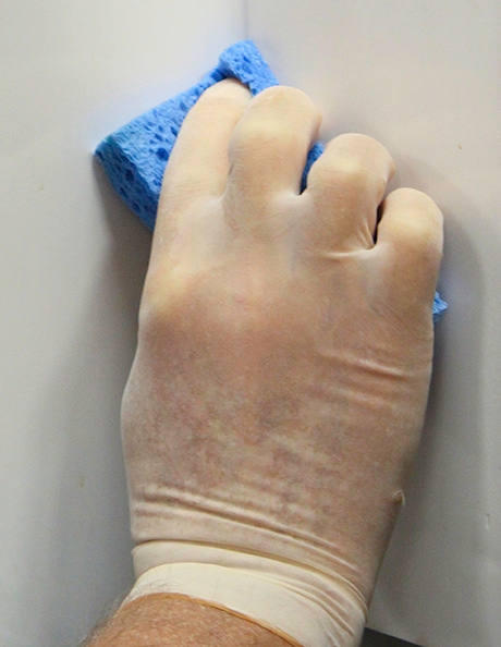 <p>Rinse the surface areas of the ice machine. Use a clean towel or sponge soaked in potable water to wipe the same surfaces: side walls, base (area above the water trough), and the bin or dispenser.</p>