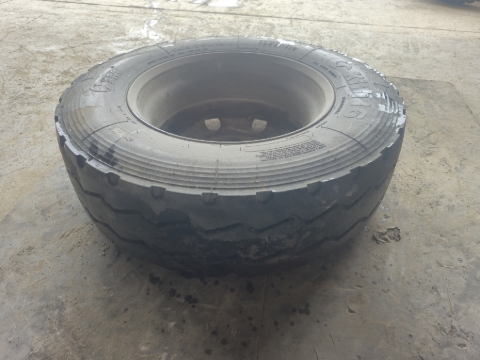 <p><strong>How It Looks for a Commercial Rim</strong></p><p>As you can see the shorter or steeper side is at the top.</p><p>For most commercial rims the standard orientation is with the disk-face down, to break and remove the first bead (see photo). Hence on an "upside down" rim the the disk-face is at the top, for removing the first bead. </p><p></p>