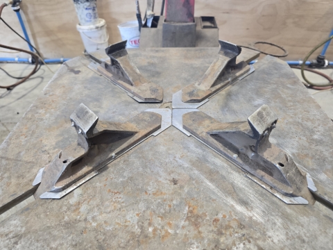 <p><strong>Clamps</strong></p><p>The clamps are responsible for holding the rim tightly to the machine</p><p>The clamps are operated by one of the foot pedals</p><p>To adjust the clamps, pull out the pin located beneath the turntable. Push the pin down and then in to expand the clamps, or pull it back to reduce their size. Making it bigger means that you are able to fix up to a 24 inch rim, while making it smaller means that you are able to do rims down to 10 inch.</p><blockquote><p>Make sure that the pin is fully seated before operating the machine.</p></blockquote><p></p>