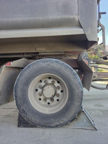 <p><strong>Preparation</strong></p><p></p><p>Ensure chocks are set and driver is clear of the truck. </p><p></p><p>Use a mat if necessary, for protection while lying on the ground. </p><p></p><p>Make sure the ground underneath the jack is solid and won’t allow for any sinking or movement of the jack. If necessary, use solid blocks of wood to support the jack.</p><p></p><p>Lock the truck out. See <klink id="f7af91b5-60e1-42cf-b9fd-60a3759270f9" step-id="1795528f-6be2-4779-adaa-28340f5e5d0b">Procedure - Lockout Device on Commercial Vehicles</klink> if you are unsure. </p>