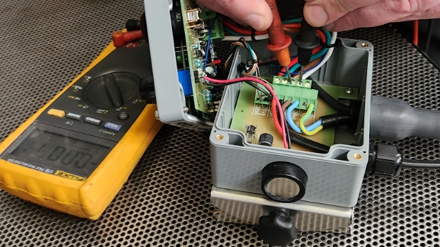 <p><strong>Measure the Existing Min. Output Voltage</strong></p><p></p><p>Set the Multimeter to DC and place the probes on the Brown (+12V) and Blue/White (Regulated Ground) Pump Power output terminals.</p><p>This should measure either:</p><p>7.0Vdc for FA600 Series Applicators</p><p>6.0Vdc for PA200 Applicators</p><p>or 5.5Vdc for PA300 Applicators.</p>