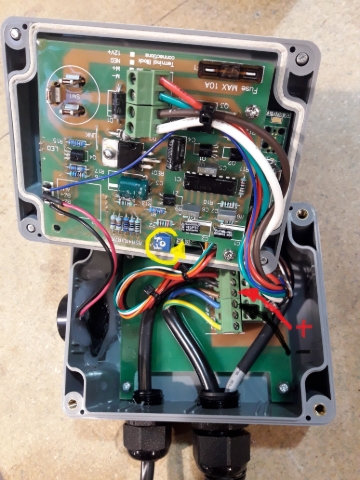 <p><strong>Open up the front cover</strong> </p><p> </p><p>Carefully open, ensure the lid seal doesnt come out if its groove.</p><p></p><p>Open enough to gain acess to the adjustment potentiometer (yellow arrow)</p><p></p><p>And allow the multimeter probes to measure the crew heads on the brown and blue pump power output terminals. (black and red arrows)</p>