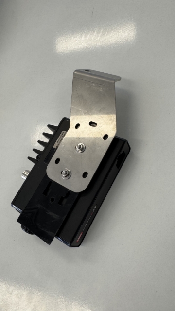 <p><strong>Step 2:</strong> Before installing, attach the UHF unit to the UHF bracket.</p>