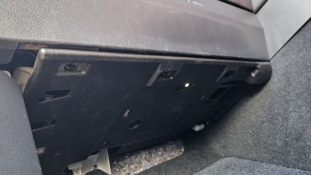 <p><strong>Step 1</strong>: Remove the cover piece from below the glove box by detaching three clips.</p>