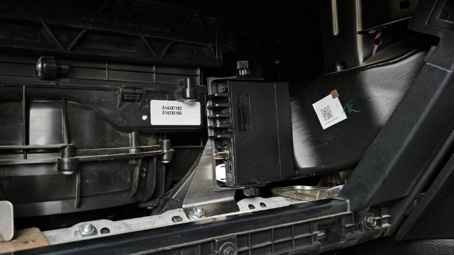 <p><strong>Step 4:</strong> Attach the assembly to the mounting point as pictured. Reinstall glovebox after wiring is complete.</p>
