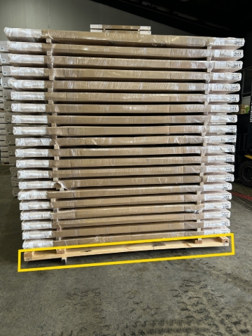 <p>The packets are removed from the Tressel tables and stacked to the desired height on top of an export container base.</p>