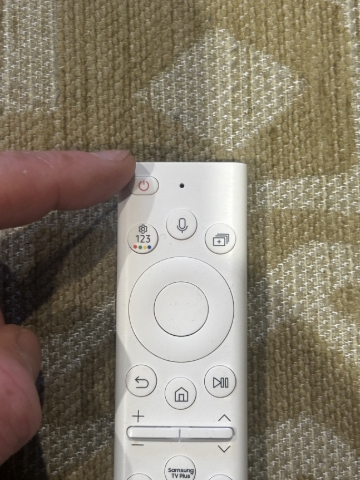<p>Use the power button on the white remote to turn the TV off. Press and hold until the TV screen goes black.&nbsp;</p>
