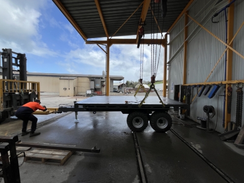 <p>Remove the stillage components from the side of the trailer.</p>