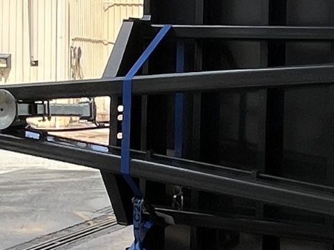 <p>Remove the drawbar retaining Strop & any packers between the deck and the front support.</p>