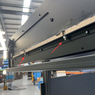 <p>The faceplate still has inaccessible clamping bolts holding it to the plywood, but can now be removed by pulling with a bit of force.</p>