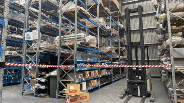 <p><strong>Operators: </strong>When working at the corner of the bay near the walkway, ensure safety belts for the bay that you are working on is up and the safety belt of the opposite bay is up across the other bay as shown. <br><br><strong>Pedestrians: </strong>Ensure that you are 2 bays away from the reach truck when operating in the corner of the bay. If it is operating at the end of the bay, stop and ensure you are at least 2 bays away from the reach.<strong> <em>Only proceed if it is safe to do so.</em> </strong></p>