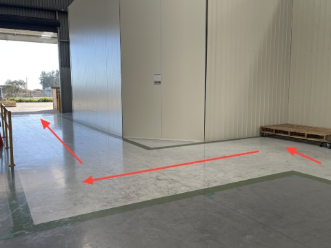<p>Use gray painted walkway at all times. <br><br><em>This is also a forklift/reach truck operation zone so be careful when passing.</em></p>
