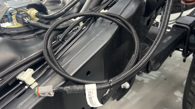 <p>Cover exposed runs with braided or split corrugated sleeving.</p>