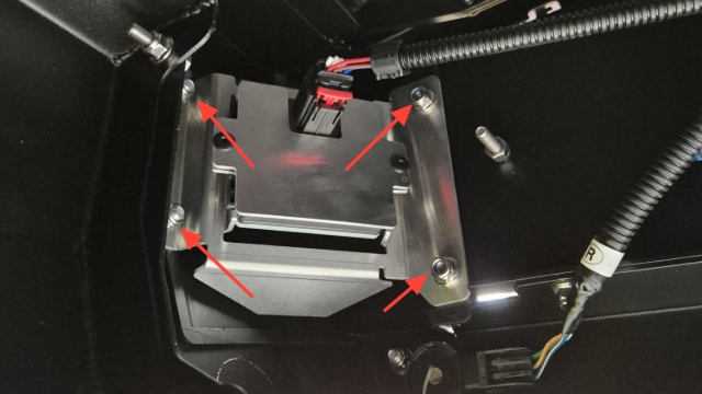 <p>Undo the 4 x M6 Nuts holding the radar in place. (Red Arrows)</p><p></p><p></p>