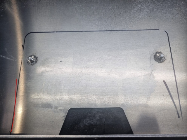 <p>remove sticker from robot welder </p><p>if sticker is within the outlined area no cleanup is required </p><blockquote><p><strong>If the sticker is outside the outlined area clean any residue with wax n grease remover. DO NOT sand the sticker residue it will just smear it around trapping dust creating rework.</strong></p></blockquote><p></p>