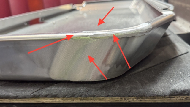 <p>Take off welds at each corner, keeping all welds smooth.</p>