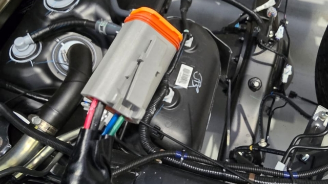 <p>Install a deutsch plug as below:</p>
<p>Unlock - Green - 1</p>
<p>Lock - Blue - 2</p>
<p>Positive - Red -3</p>
<p>Earth - Black - 4</p>