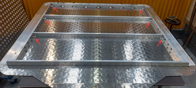 <p>Completed underside welding</p><p></p><blockquote><p><strong>NOTE:</strong> The hinge extrusion welds and corner welds should be the only welds visible from the rear </p></blockquote><p></p>