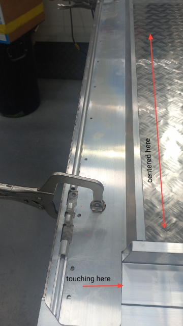 <p>Clamp front extrusion into place ensure it's centered between the side rail extrusion</p>