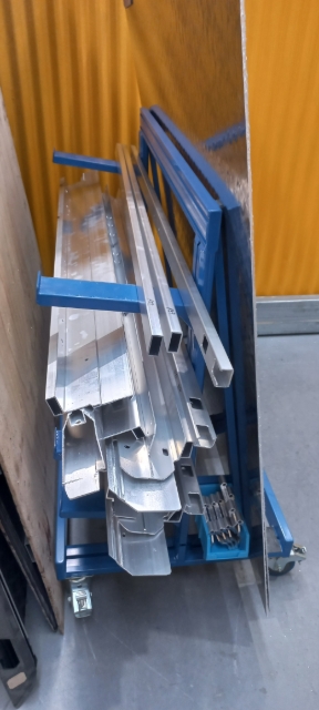 <p>Get extrusion from trolley and set out on lid shell</p>