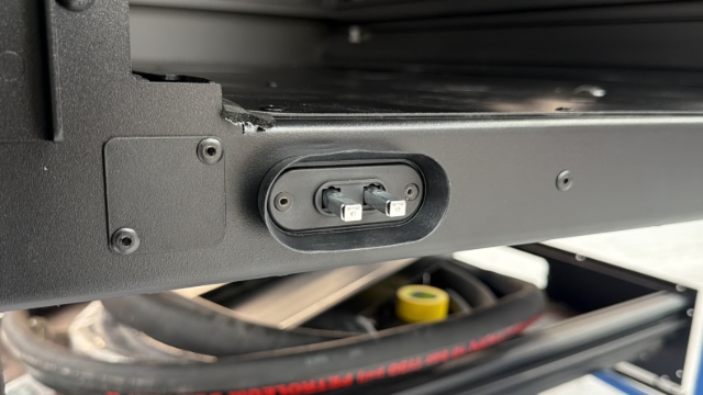 <p>Rivet the number plate light contact plunger to the body.</p><blockquote><p><strong>CQC: </strong>Ensure the rubber shroud is riveted behind the plate.</p></blockquote><p></p>