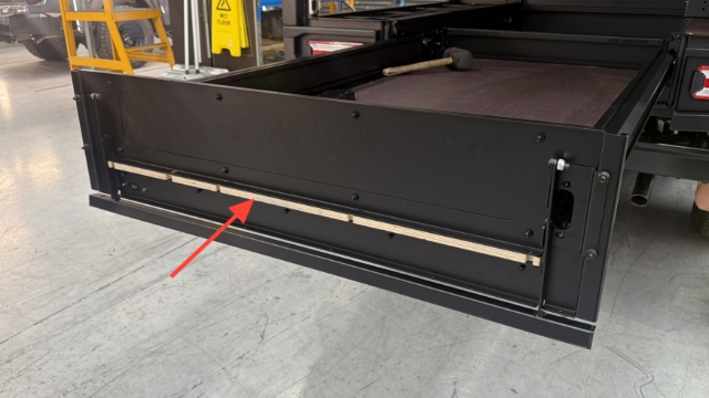 <p>Sit the backing plate over the front of the plywood.</p>