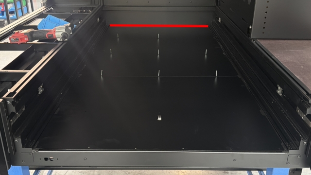 <p>Rivet the dust covers to the cross members.</p><p><em>Note: If the front rivets are too hard to access from underneath the body, run a bead of SMP60 silicone across the top of the front cross member to keep the front of the dust cover fixed in place.</em></p>