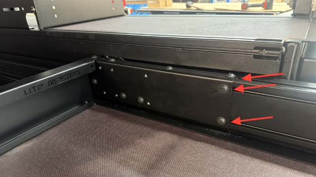 <p>Slide 3 t-track thread plates into the drawer extrusion, then fix the latch cover to the drawer carriage using 8 M8x12mm flange bolts.</p>