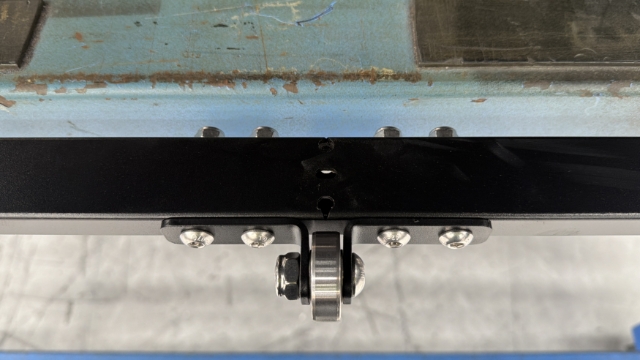 <p>Install the bearing brackets to the rear centre cross member using 4x M8x50mm button head bolt and M8 nyloc nuts.</p><p>Tighten all bolts.</p>