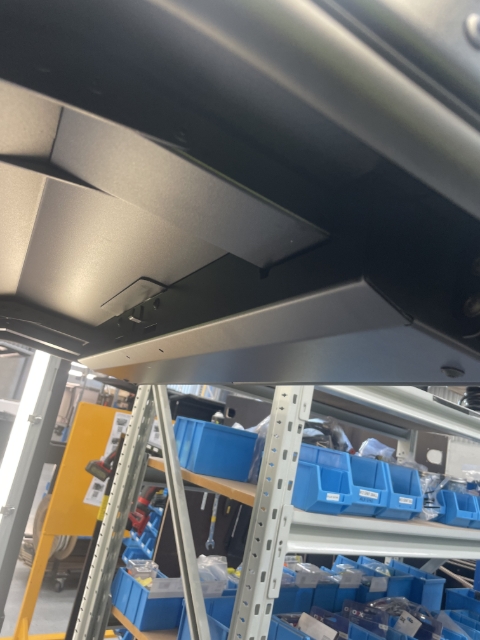 <p>To assess the part number or replace shaft, Remove lock cover by unscrewing 4x M6 screws with a 4mm hex bit or Allen key.</p><blockquote><p>Note: These are secured in place using Loctite, you will need to break the Loctite using an Allen key before fully removing with an impact driver. </p></blockquote><p></p>