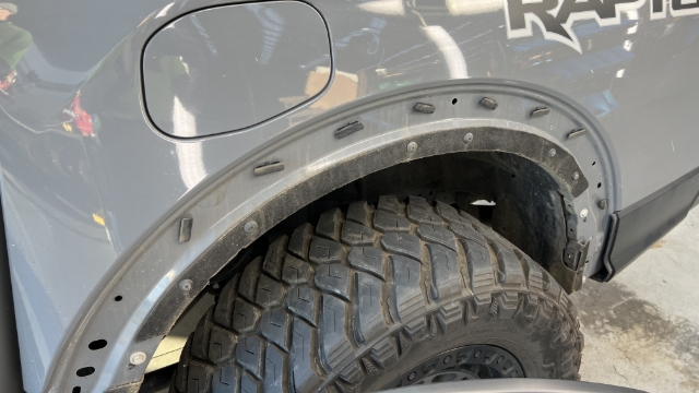 <p>If Raptor, carefully remove fender liner using a plastic pry tool. Remove Phillips liner clips and place into plastic bag. </p>